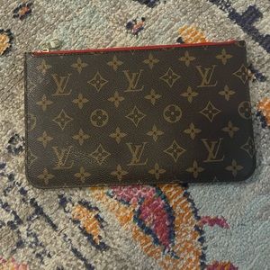 Brand new Louis Vuitton clutch perfect condition just missing the wristlet band